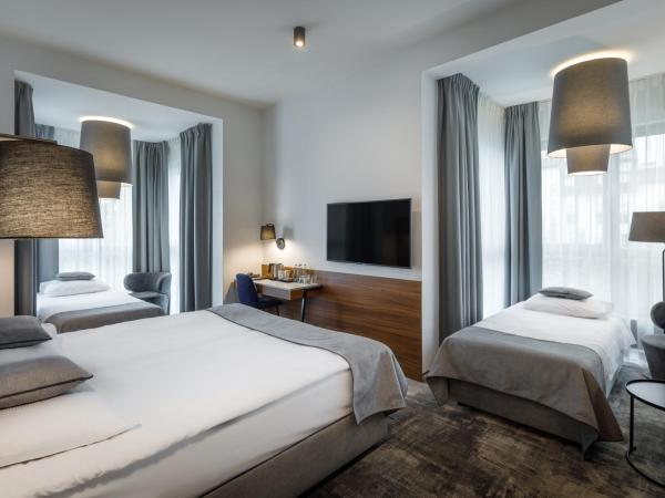 Garden Square Hotel : photo 2 de la chambre chambre quadruple