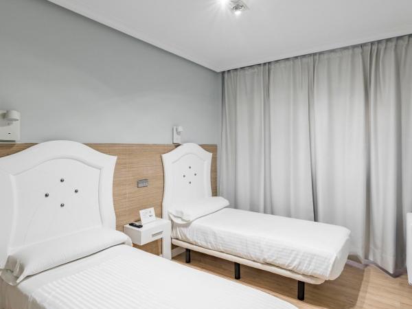 Hostal Los Ángeles : photo 5 de la chambre chambre lits jumeaux standard