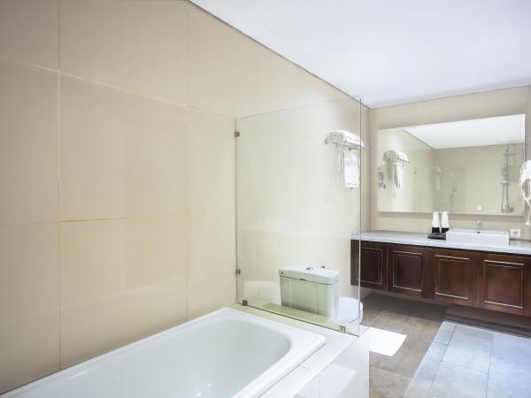 Grand Rohan Jogja : photo 4 de la chambre chambre lit king-size exécutive