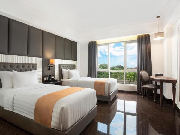 Grand Rohan Jogja : photo 1 de la chambre chambre de luxe lits jumeaux