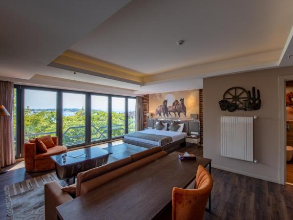 Riva's Moda : photo 3 de la chambre chambre lit king-size - vue sur mer