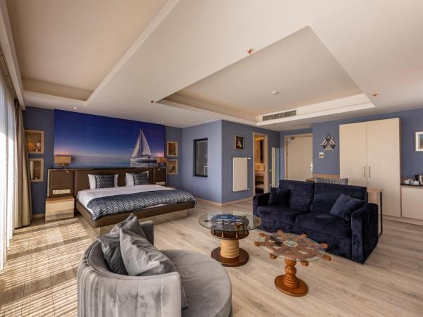 Riva's Moda : photo 10 de la chambre chambre lit king-size - vue sur mer