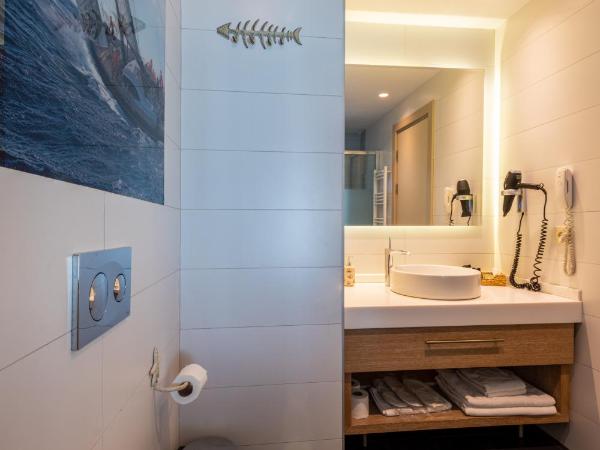 Riva's Moda : photo 6 de la chambre chambre lit king-size - vue sur mer