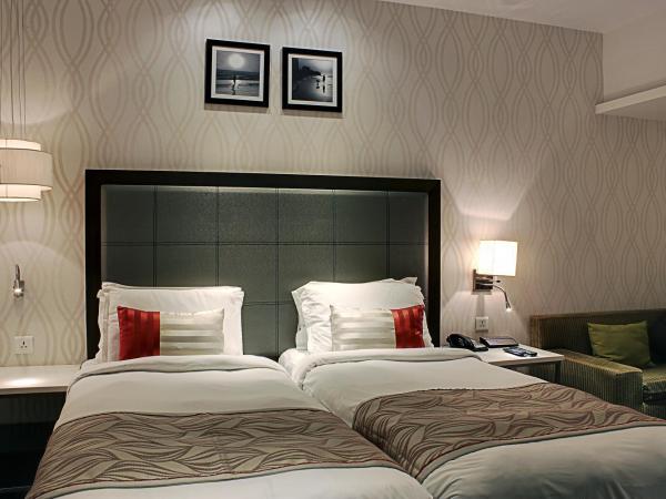 The Sahil Hotel : photo 1 de la chambre chambre supérieure avec lits jumeaux