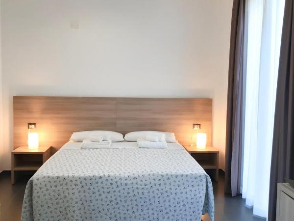 RipamontiBnB : photo 2 de la chambre chambre quadruple avec terrasse