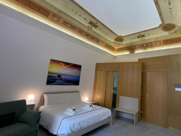 Le Quattro Stagioni - Rooms & Suite : photo 1 de la chambre suite avec balcon