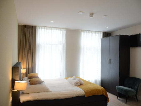 NL Hotel District Leidseplein : photo 2 de la chambre chambre quadruple