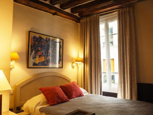 Hôtel du Cygne Paris : photo 5 de la chambre chambre double