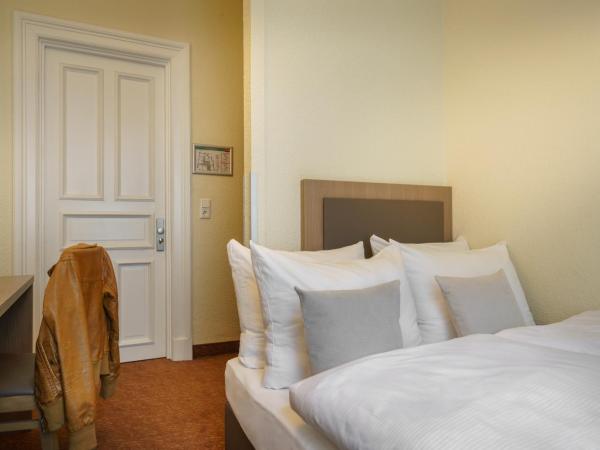 Novum Hotel Alster Hamburg St. Georg : photo 1 de la chambre chambre lit queen-size 