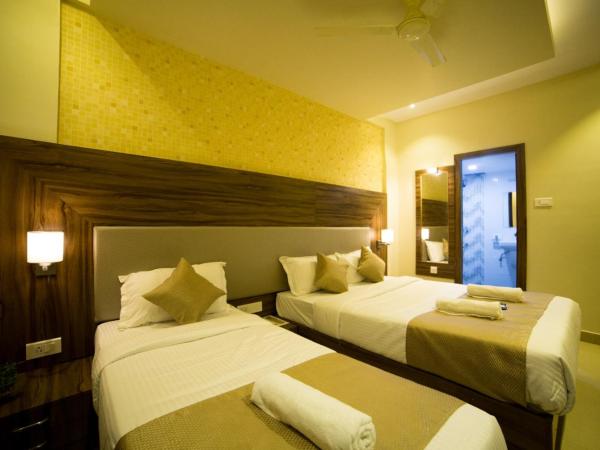 Hotel Plaza Heights : photo 5 de la chambre chambre triple exécutive