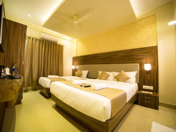 Hotel Plaza Heights : photo 1 de la chambre chambre triple exécutive