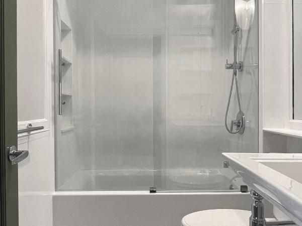 Clarendon Square : photo 9 de la chambre chambre lit queen-size deluxe