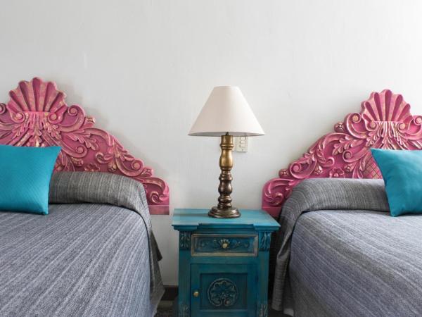 Hotel Boutique Naura Centro : photo 7 de la chambre suite junior avec 2 lits doubles 