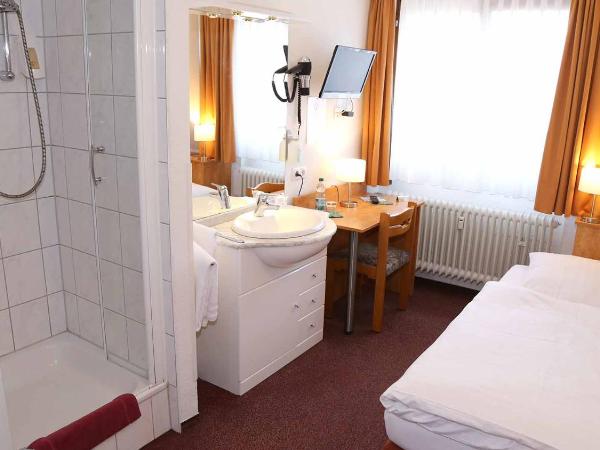 Hotel Garni Kluth : photo 1 de la chambre chambre simple avec salle de bains commune