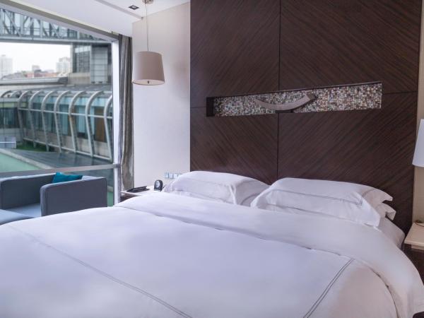 InterContinental Qingdao, an IHG Hotel - Inside the Olympic Sailing Center : photo 1 de la chambre one-bedroom suite with city view - club lounge access