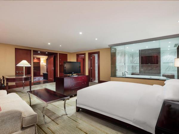 Crowne Plaza Wuxi City Center : photo 4 de la chambre suite présidentielle lit king-size