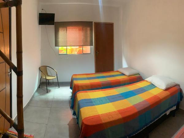 Pousada Ibituruna - Aeroporto de Congonhas : photo 2 de la chambre chambre triple avec salle de bains privative