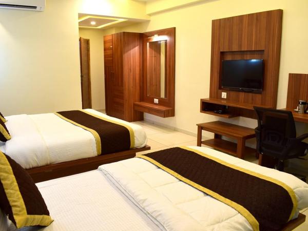 The Royal Square - Sky Stays (Chandkheda) : photo 3 de la chambre chambre triple
