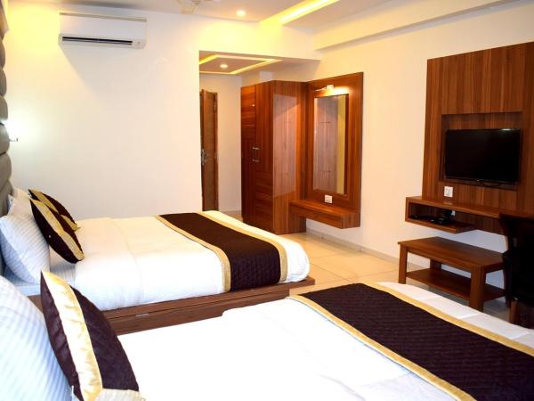 The Royal Square - Sky Stays (Chandkheda) : photo 2 de la chambre chambre triple
