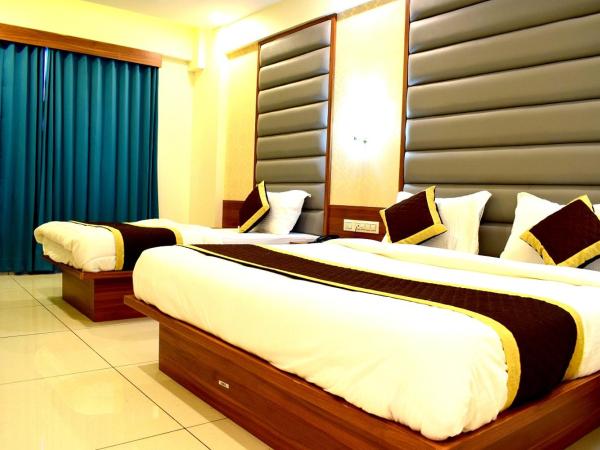 The Royal Square - Sky Stays (Chandkheda) : photo 6 de la chambre chambre triple