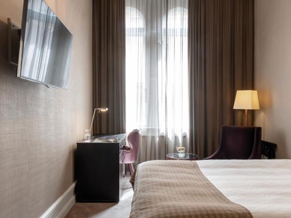 Elite Plaza Hotel : photo 4 de la chambre petite chambre double