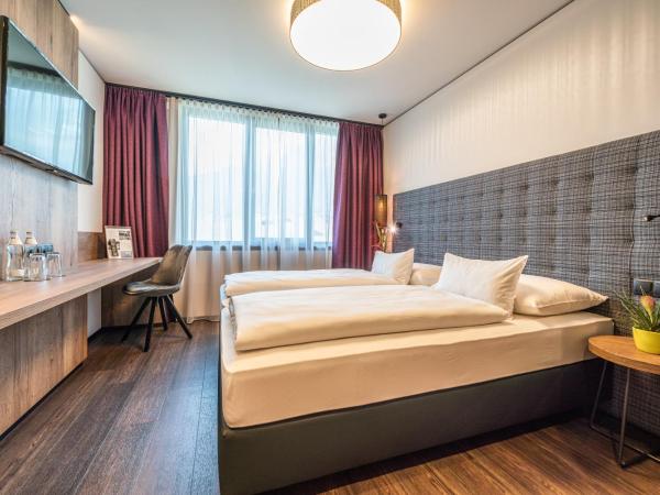 Rufi's Hotel Innsbruck : photo 1 de la chambre chambre double ou lits jumeaux