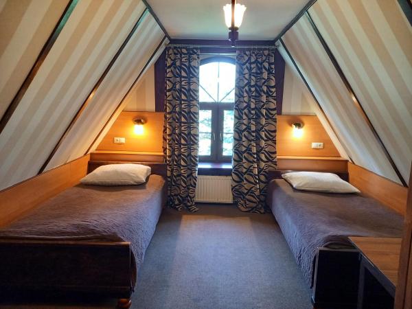 Dworek staropolski : photo 1 de la chambre petite chambre lits jumeaux