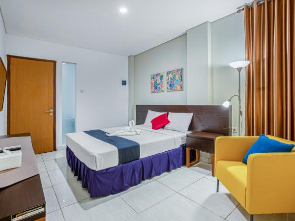 Sans Hotel Prime Cailendra Yogyakarta by RedDoorz : photo 2 de la chambre chambre deluxe