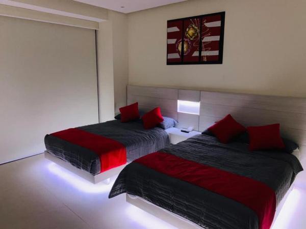 DEPARTAMENTO DE LUJO EN ACAPULCO DIAMANTE : photo 4 de la chambre chambre lits jumeaux