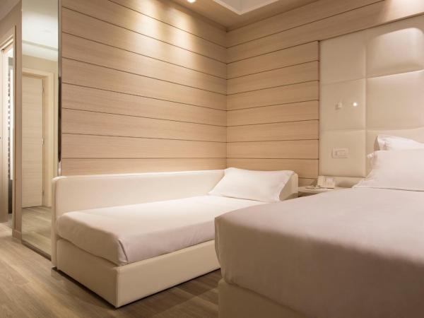 Almar Jesolo Resort & Spa : photo 4 de la chambre chambre triple deluxe - vue sur mer