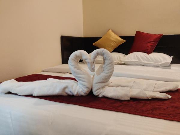 SRI VIGNESH RESIDENCY : photo 6 de la chambre chambre double deluxe (2 adultes + 1 enfant)