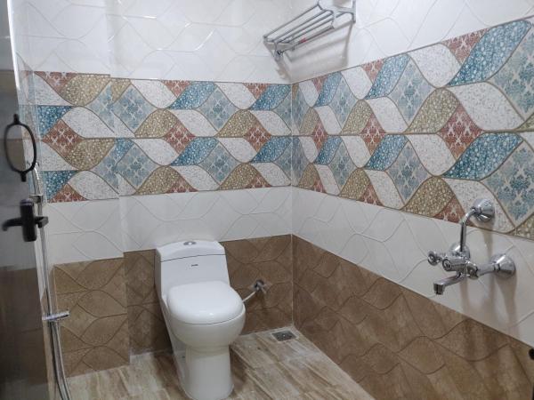 SRI VIGNESH RESIDENCY : photo 5 de la chambre chambre double deluxe (2 adultes + 1 enfant)