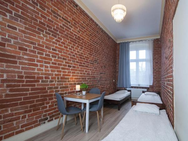 Vanilla Hostel Wrocław : photo 8 de la chambre chambre triple avec salle de bains privative