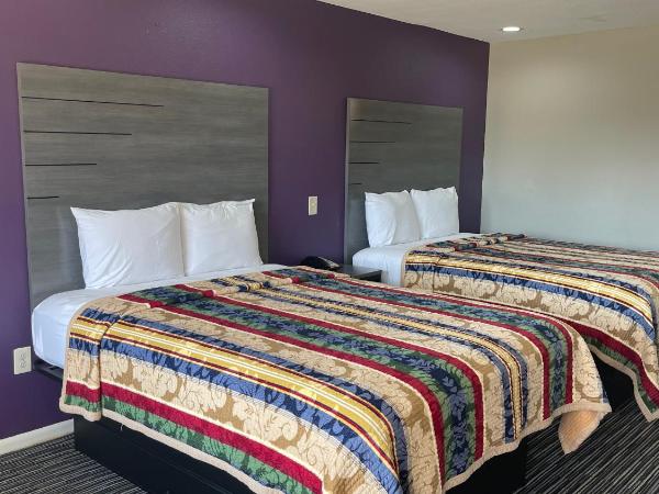 Executive Inn and Suites Houston : photo 1 de la chambre chambre avec 2 grands lits queen-size