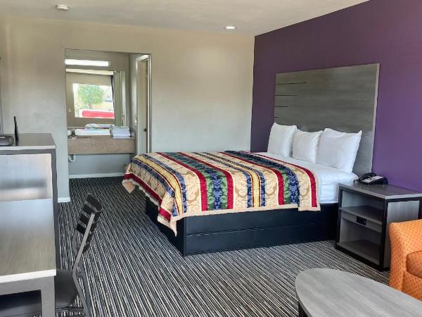 Executive Inn and Suites Houston : photo 1 de la chambre chambre lit king-size