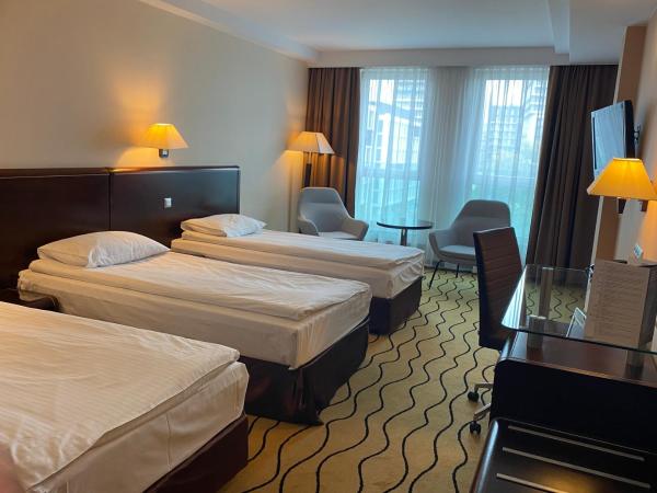 Ambasador Centrum : photo 1 de la chambre chambre triple