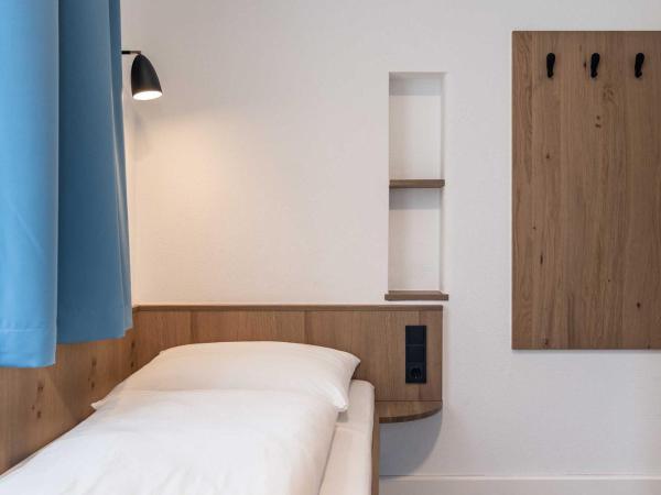 Villa Flöckner Bed & Breakfast : photo 4 de la chambre petite chambre lits jumeaux