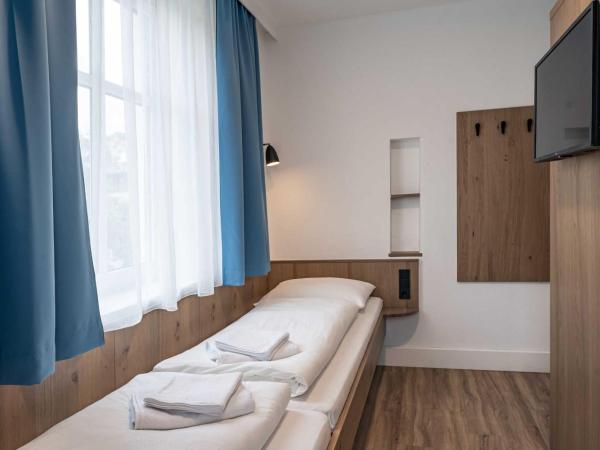 Villa Flöckner Bed & Breakfast : photo 1 de la chambre petite chambre lits jumeaux