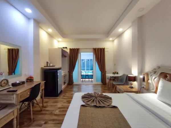 Hi Chiangrai Hotel-SHA Extra Plus : photo 2 de la chambre hébergement lit king-size deluxe - côté piscine