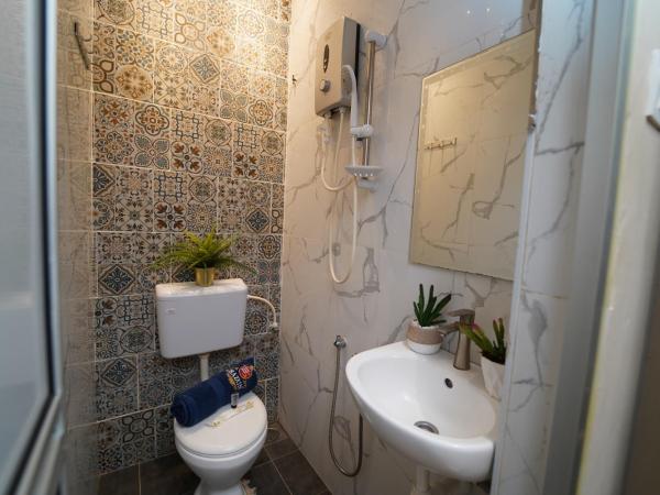 Ghazrin's Classic : photo 9 de la chambre chambre simple avec salle de bains privative