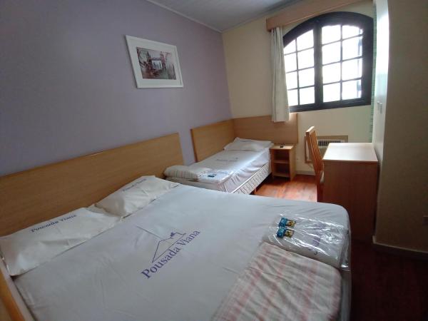 Hotel Pousada Viana : photo 1 de la chambre chambre triple avec salle de bains privative