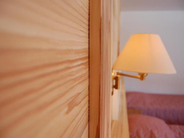 Le Roitelet : photo 9 de la chambre chambre quadruple supérieure avec balcon