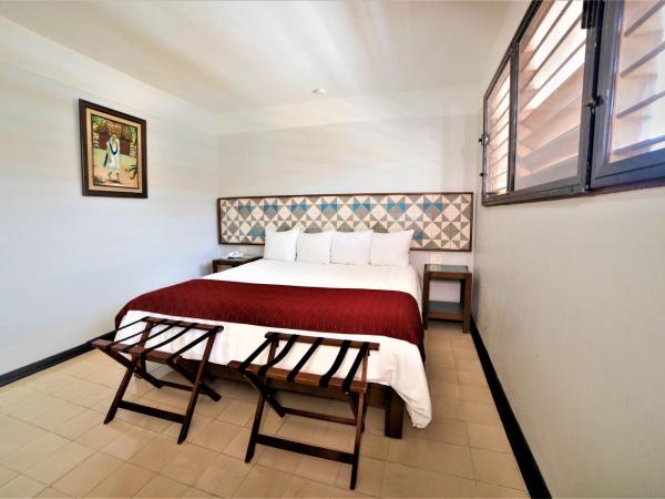 Hotel Caribe Merida Yucatan : photo 4 de la chambre chambre lit king-size