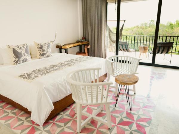 Hotel B Unique : photo 1 de la chambre grand hébergement - vue sur jungle