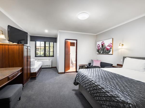 Adelaide Inn : photo 1 de la chambre hébergement lit queen-size et simple standard
