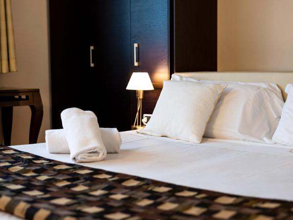 Hotel San Marco Fitness Pool & Spa : photo 2 de la chambre chambre quadruple supérieure