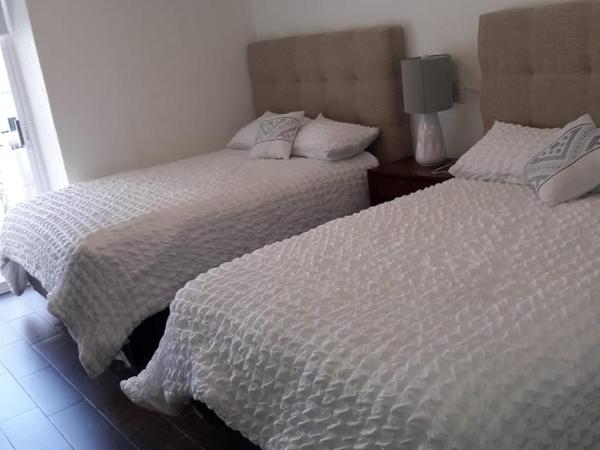 Acapulco Hotel y suites mediterrane : photo 10 de la chambre chambre lits jumeaux