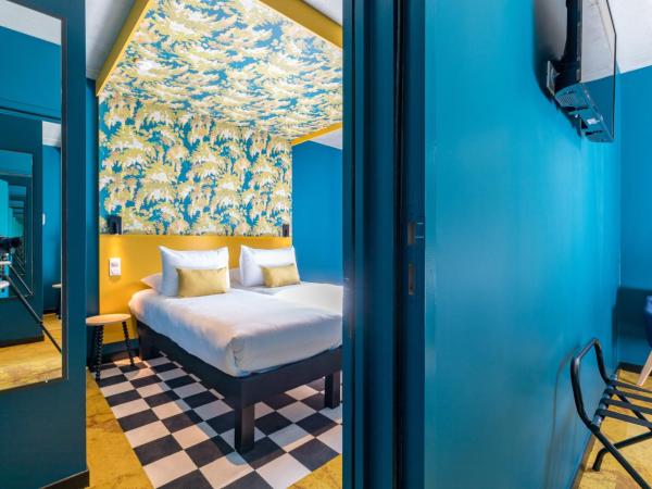 ibis Styles Dijon Sud Domaine De Beauregard 21600 Longvic : photo 1 de la chambre chambre lits jumeaux standard