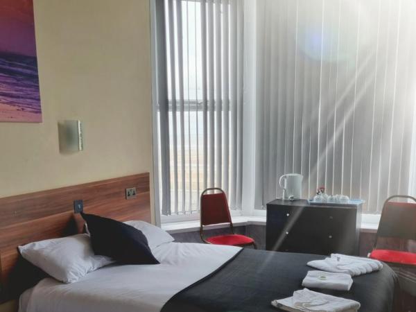 The Royal Windsor Hotel : photo 6 de la chambre chambre quintuple avec vue sur la mer