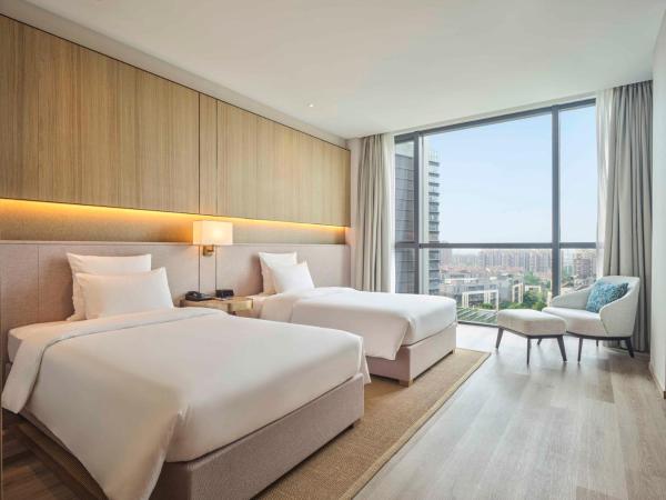 Novotel Shanghai Qingpu Excellence : photo 1 de la chambre chambre lits jumeaux supérieure